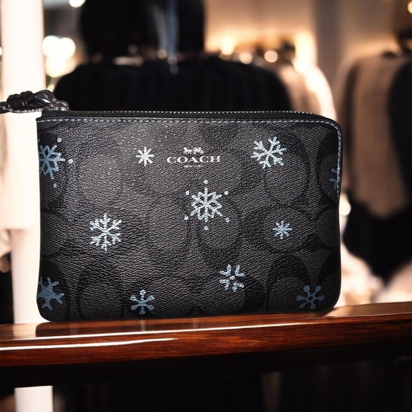 Coach Handbags - Coach Monogram Snowflakes Wristlet